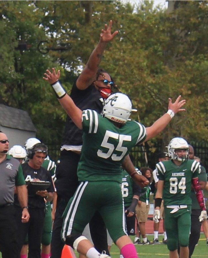 Senior+Conor+France+celebrates+with+lineman+Coach+G+after+the+touchdown.+Photo+credits+go+to+Mr.+Zondlo+P21
